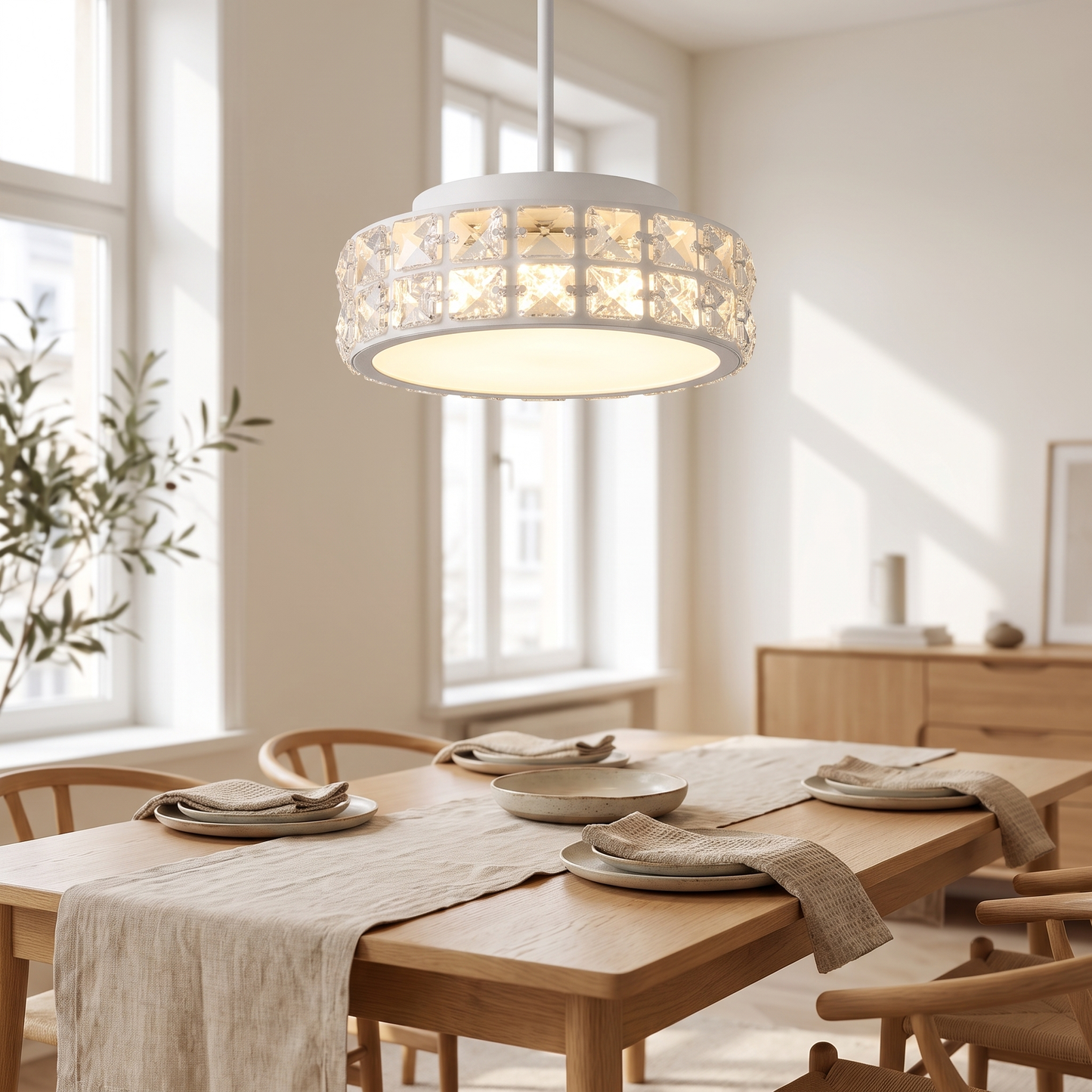 Paragon Nordic Crystal Chandelier above a dining table in a bright dining room